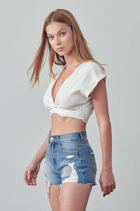 High Rise Destroyed Medium Wash Denim Shorts