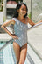 Marina West Swim Float On Asymmetrical Neck One-Piece in Black king-general-store-5710.myshopify.com